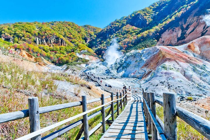 Boardwalk through the steaming Jigokudani volcanic valley at Noboribetsu Onsen, Hokkaido
