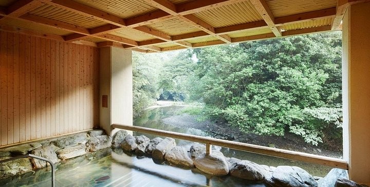 Steam rising from a hot spring bath near Mt. Inunaki, south of Osaka
